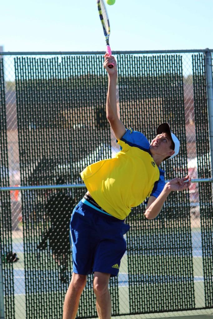 Doubles player_________ concentrates on his serve with the hopes of gaining another point.