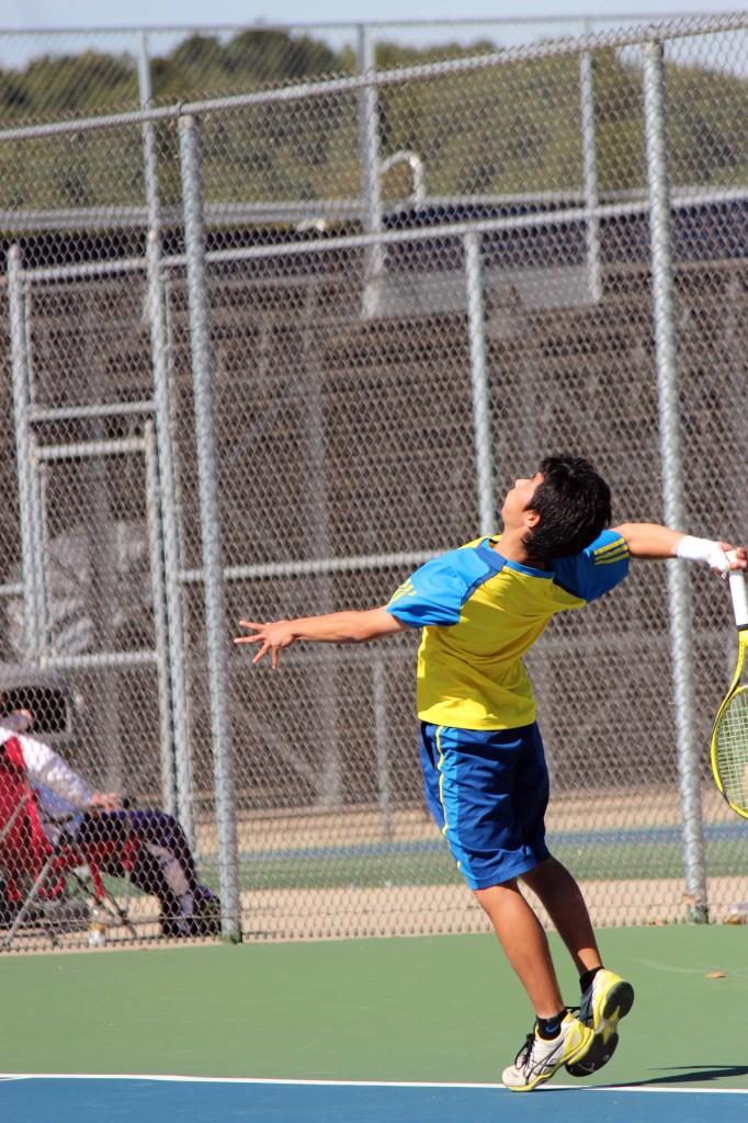 Exchange student and singles player ___________ sets up the play with an impressive serve.