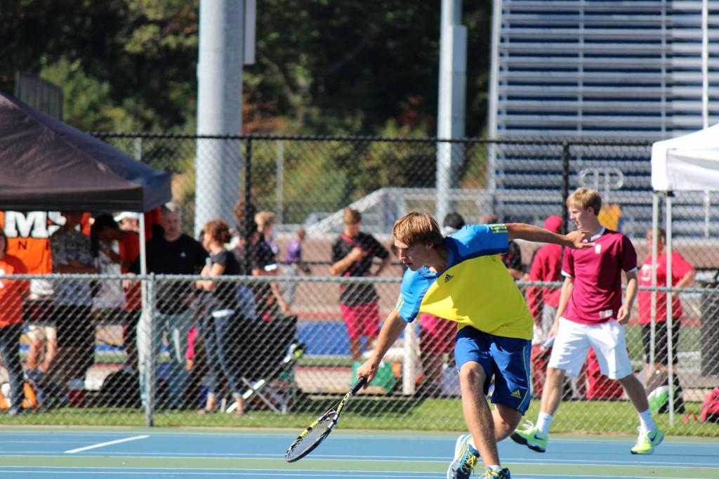 Senior single player Korey Searle picks up the play with an unbeatable save. 