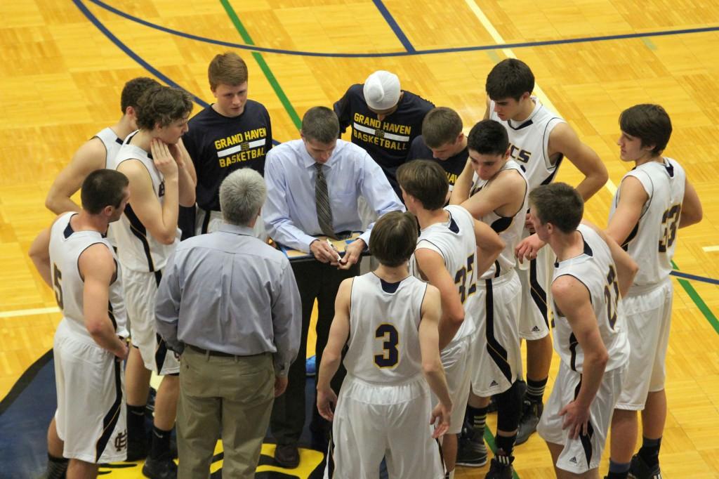 Head Coach Steve Hewitt calls timeout to regroup his team during the second quarter. (Hoffman) 