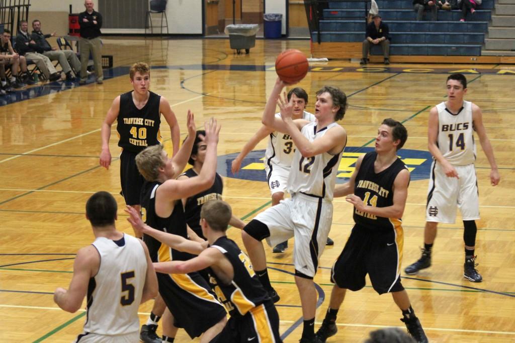Junior Noah Lein puts up a floater in the lane adding to his 6 points. (Hewitt)  